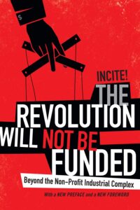 book cover for The Revolution Will Not Be Funded; stark red with bold black and white lettering decorated with an image of a hand, sporting a dollar sign cufflink, holding the strings of a marionette